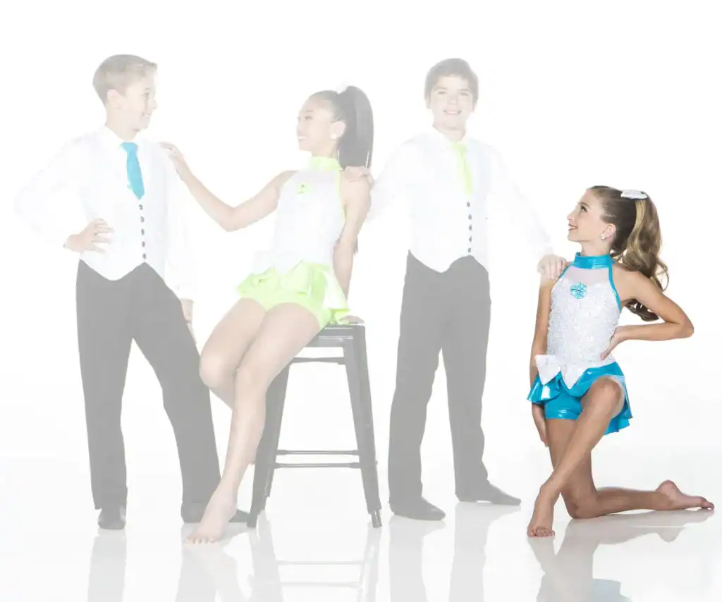 Young dancers in colorful costumes posing against a white background