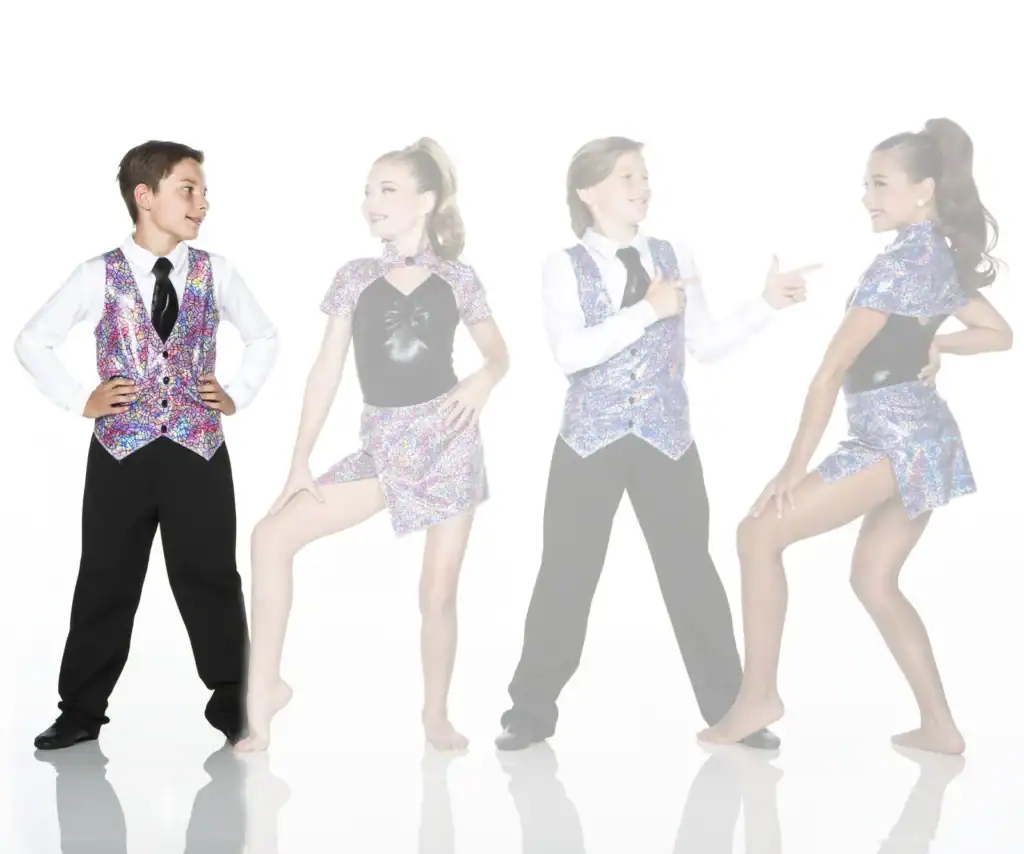 Four young dancers wearing colorful mosaic-patterned costumes pose together.