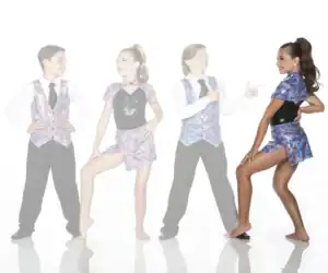 Four young dancers wearing colorful patterned dance costumes