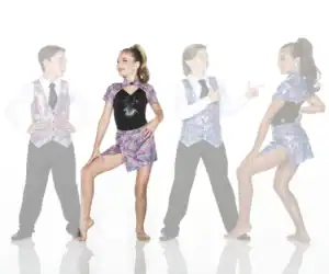 Four young dancers wearing colorful mosaic-patterned costumes pose together.