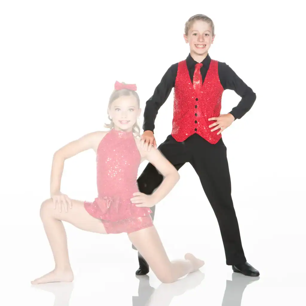 Young dance partners pose in sparkling red costumes.