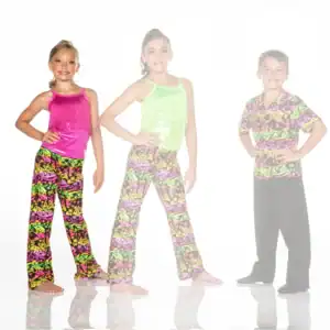 Three children modeling colorful dance costumes against white background