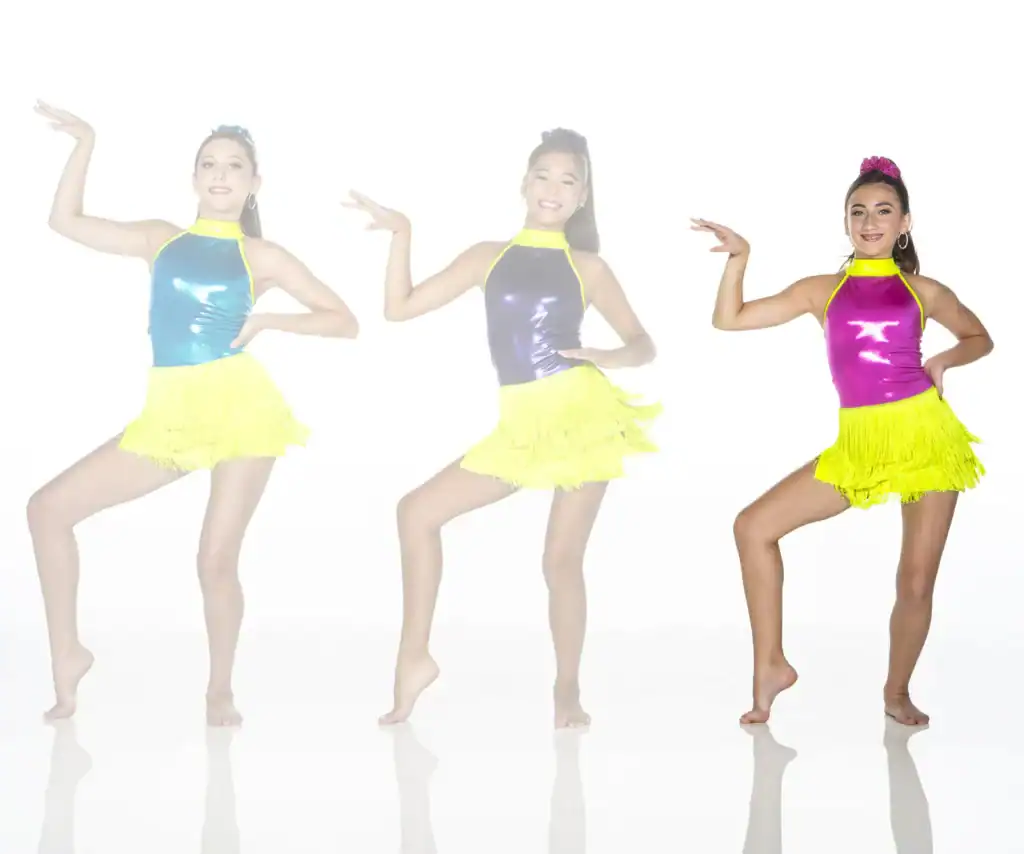 Three dancers modeling colorful fringe costumes against white background.