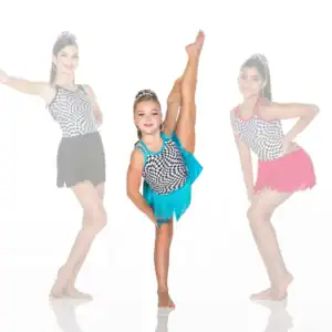 Three young dancers in checkered fringe costumes pose together.