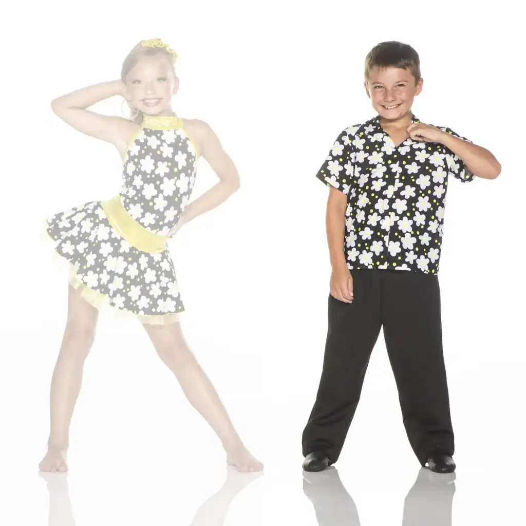 Two children wearing matching black floral dance costumes