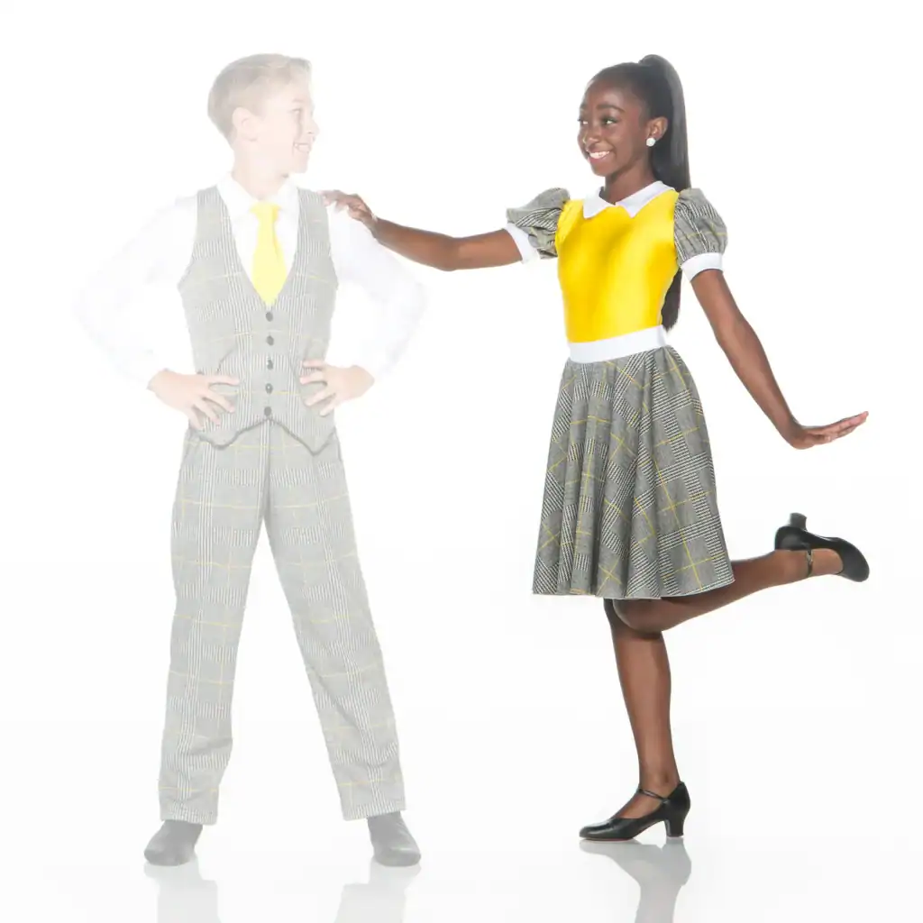 Two children model coordinated gray plaid outfits with yellow accents.