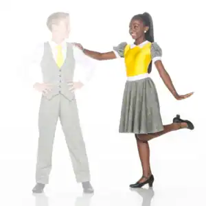 Two children model coordinated gray plaid outfits with yellow accents.