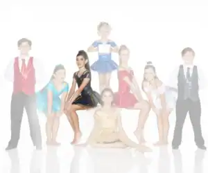Eight young dancers pose in colorful costumes against white background.