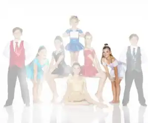 Young dancers in colorful costumes posing together