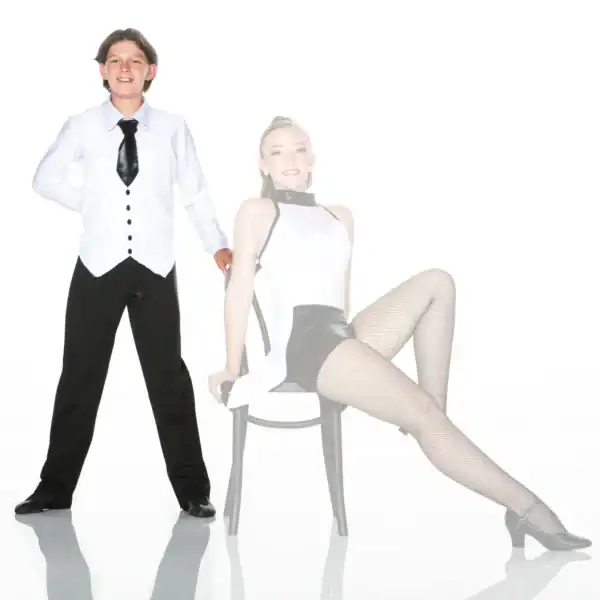 Two young dancers pose in black-and-white costumes.