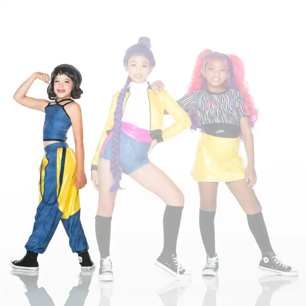 Three children modeling colorful costumes against a white background