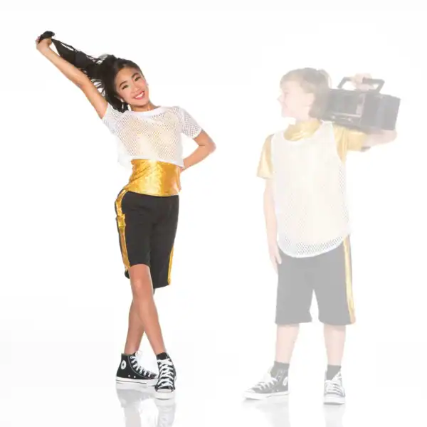 Two children in gold outfits pose with a boombox.