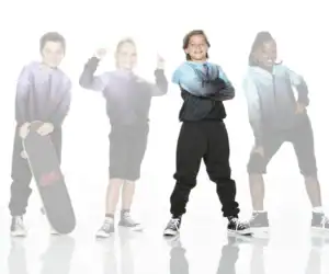 Four children modeling hoodies and sneakers, one holding skateboard