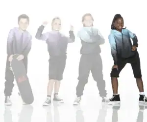 Four kids in hoodies pose against a white background.