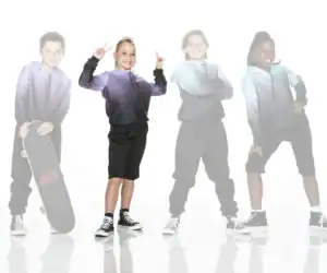 Four children modeling hoodies and sneakers, one holding skateboard