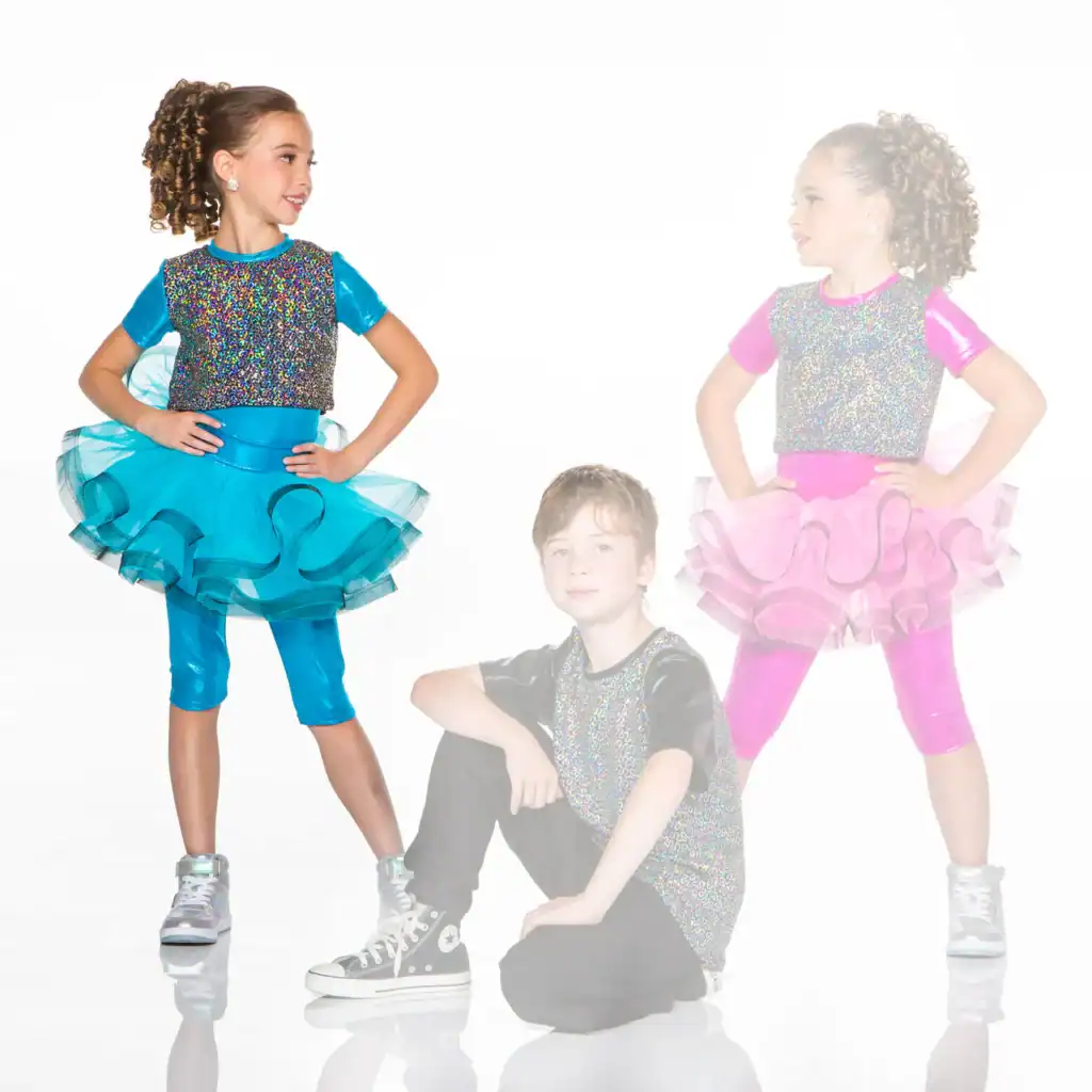 Children wearing colorful glittery dance costumes