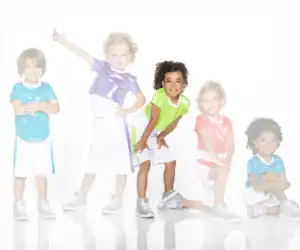 Five children in colorful sporty outfits posing on white background