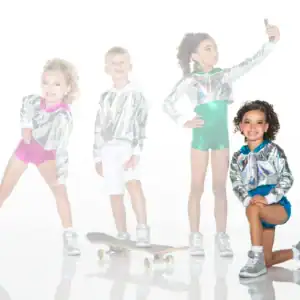 Four children wearing silver jackets pose with skateboard and phone.