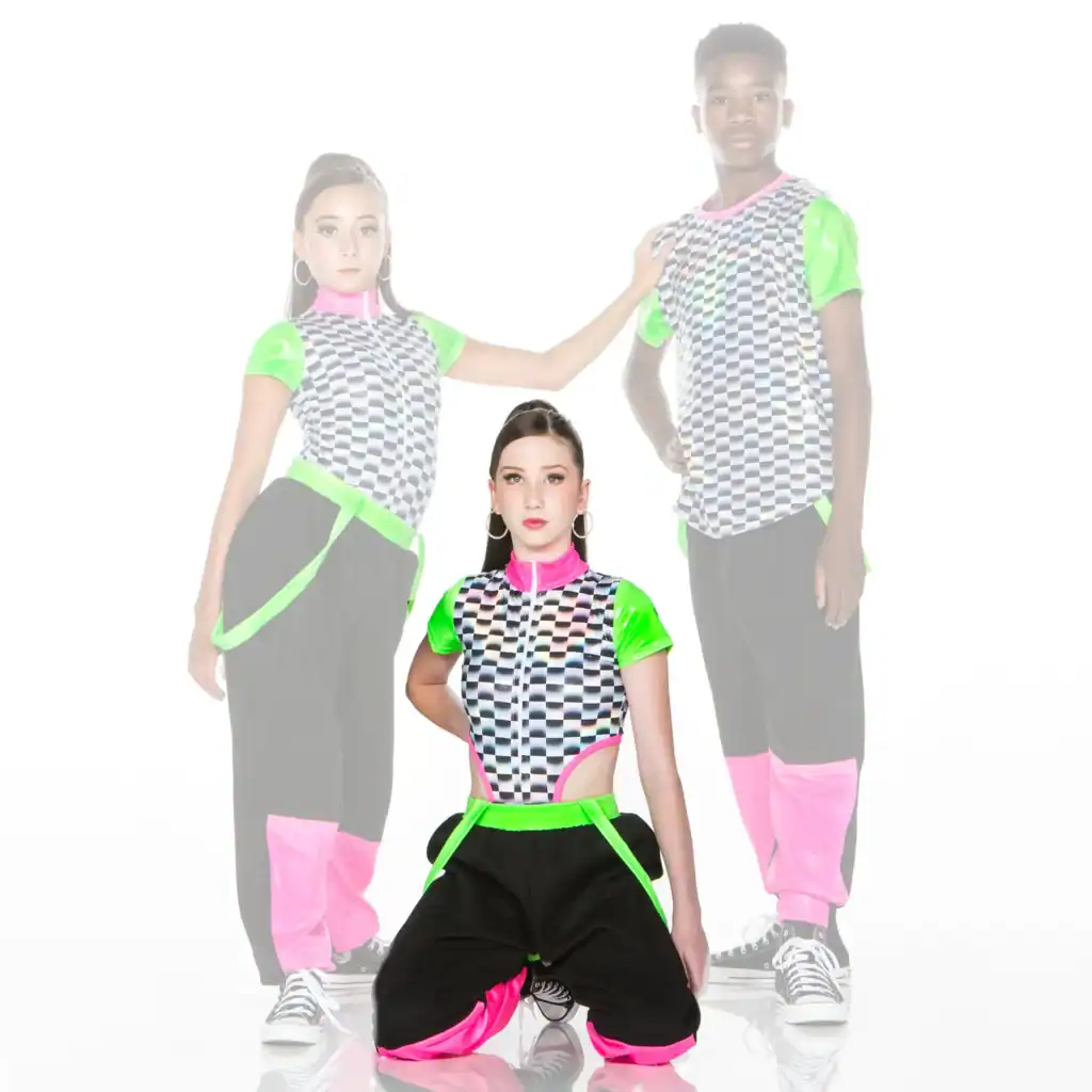 Three dancers in neon checkerboard outfits pose against white background.