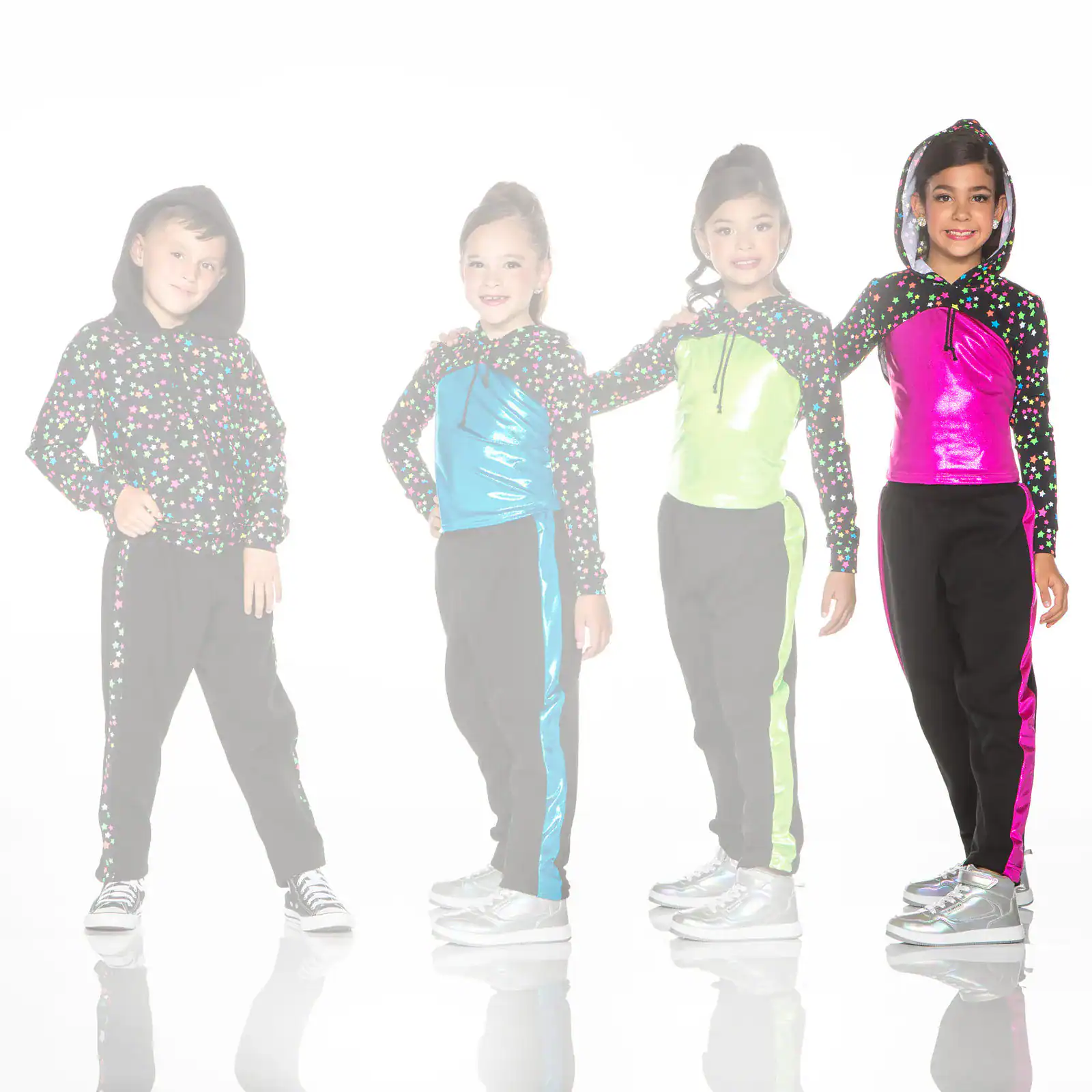 Four children wearing colorful star-patterned hooded tracksuits.