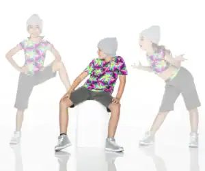 Three children modeling colorful geometric shirts and gray beanies
