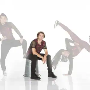 Man seated between two posed images of a female dancer