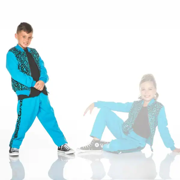 Two children wearing matching turquoise leopard-print dance outfits
