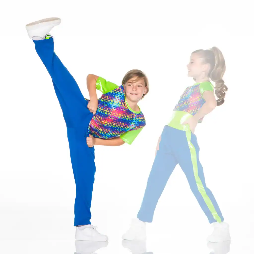 Young dancer performs high leg kick beside ghosted pose.