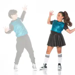 Two children dancing in matching blue sequined outfits