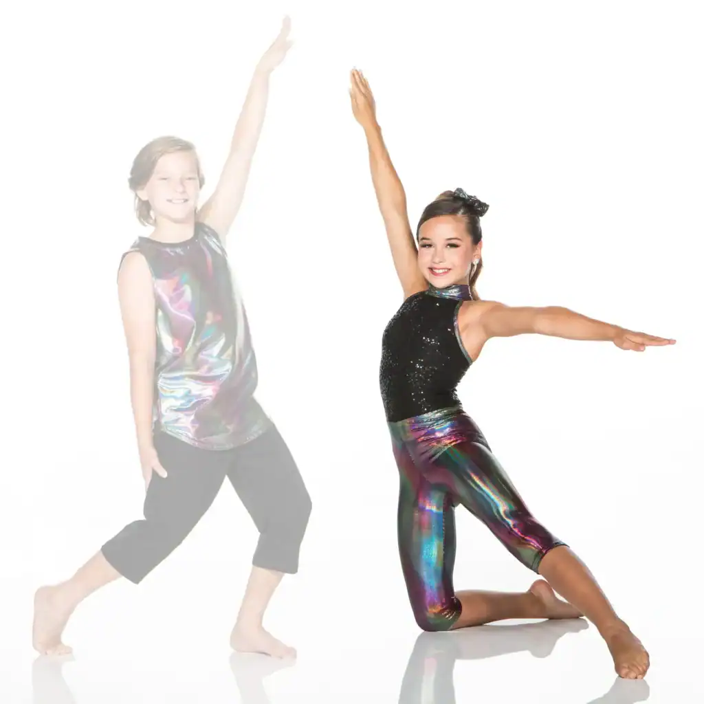 Two young dancers pose in iridescent costumes.