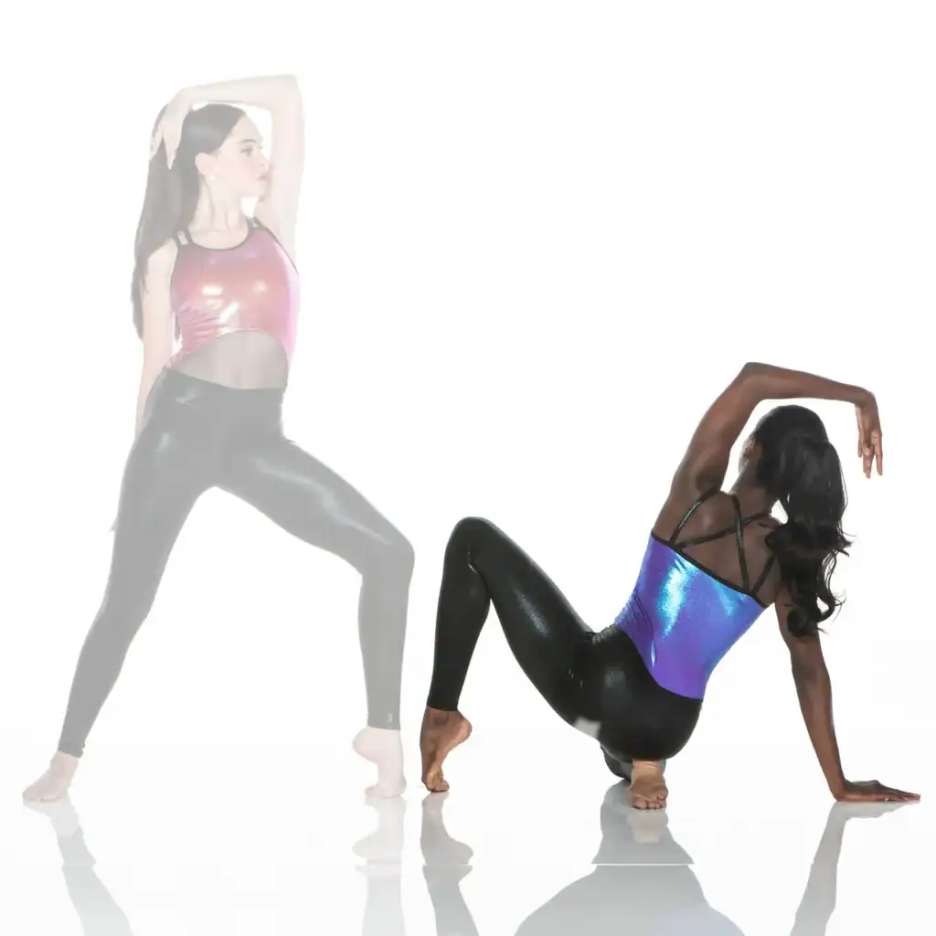Two dancers modeling metallic bodysuits and black leggings
