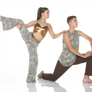 Two dancers pose in colorful patterned costumes.