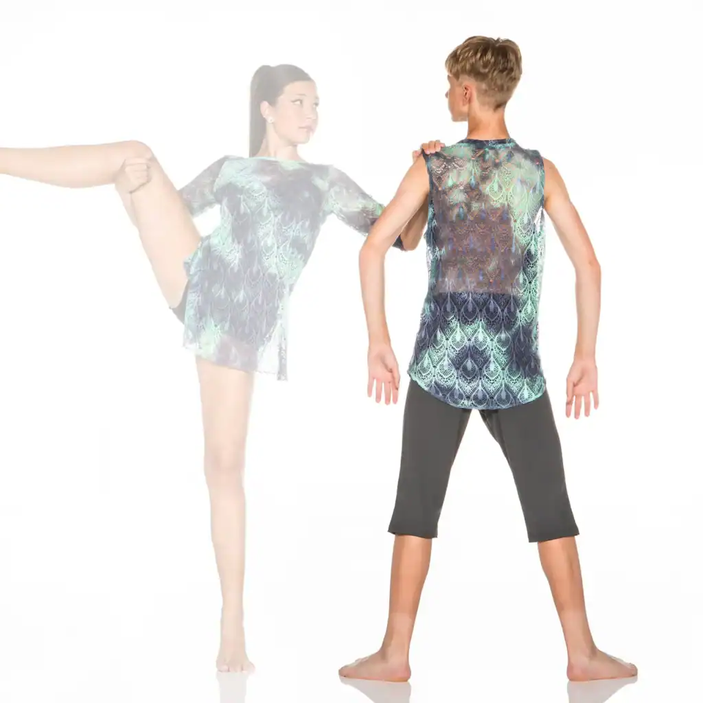 Young dancers modeling patterned costumes in a studio