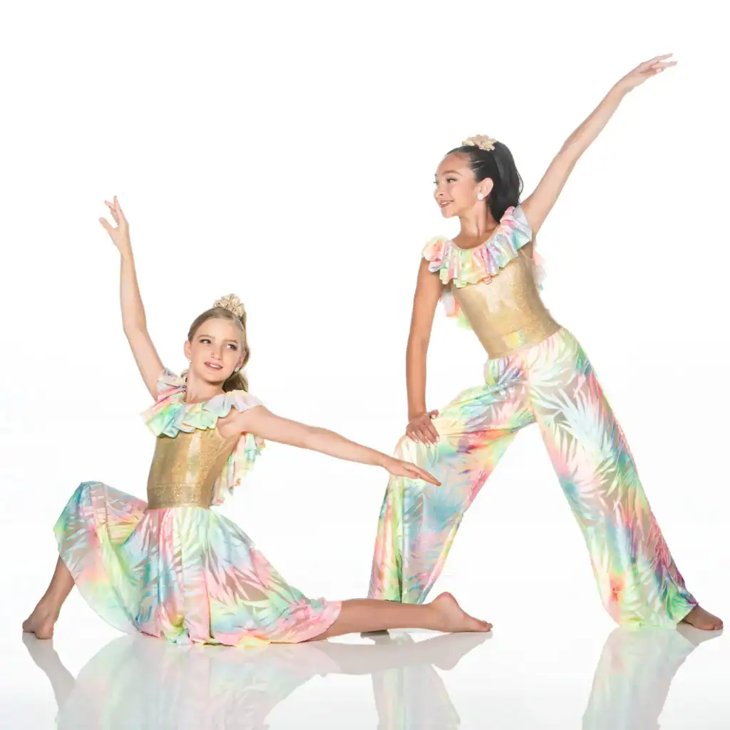 Two young dancers pose in colorful pastel costumes.