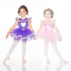 Two young ballerinas in purple and pink tutus