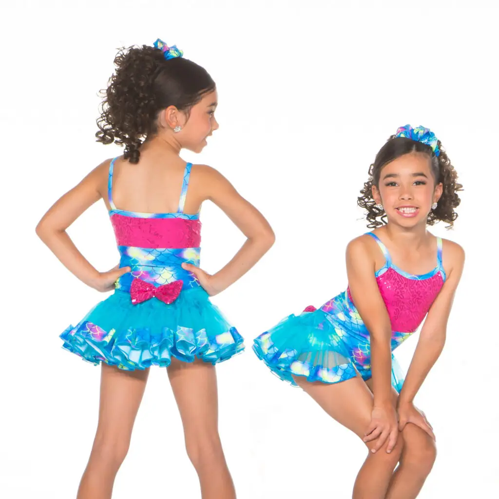 Girl modeling colorful blue and pink dance costume