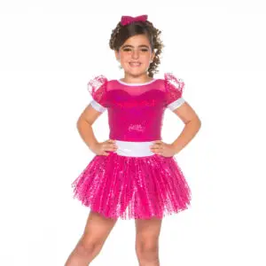 Girl wearing a sparkling pink dance costume with bow
