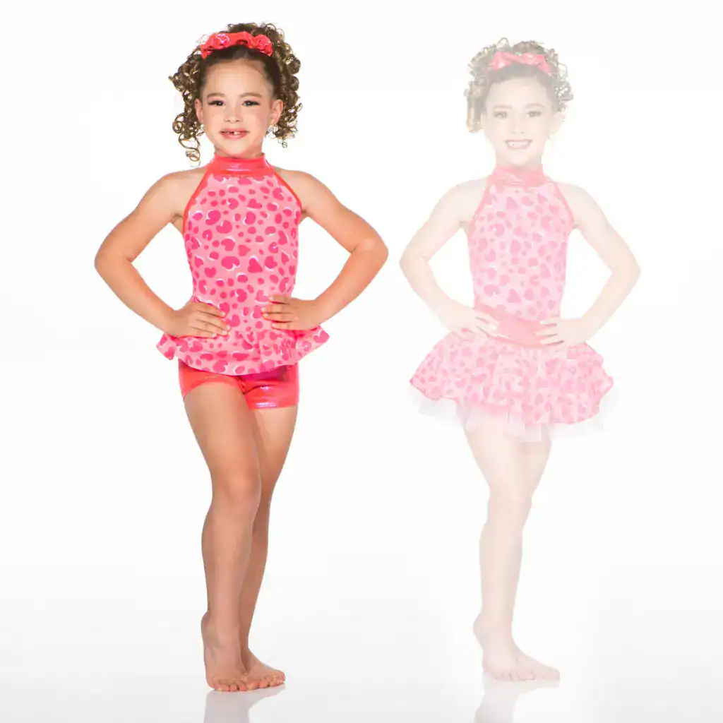 Girl modeling pink heart-print dance outfits
